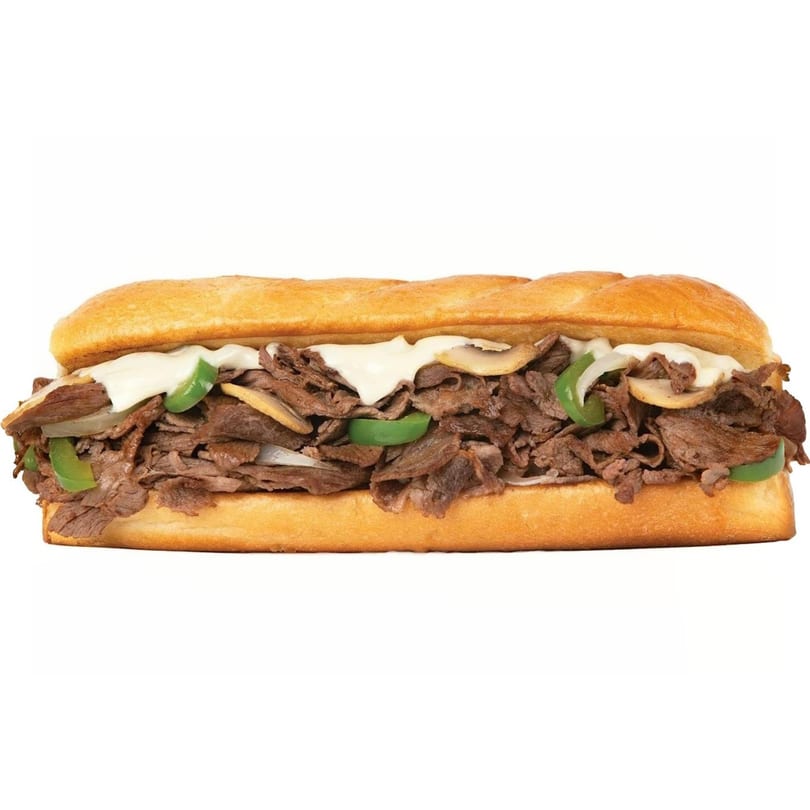 A Gyro Wrap cheesesteak with steak, green peppers, onions, mushrooms, and white sauce.